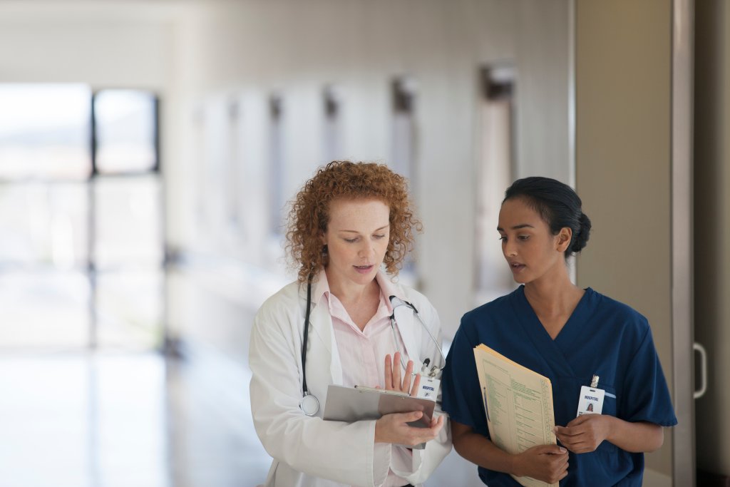 Nurse and doctor in a hallway